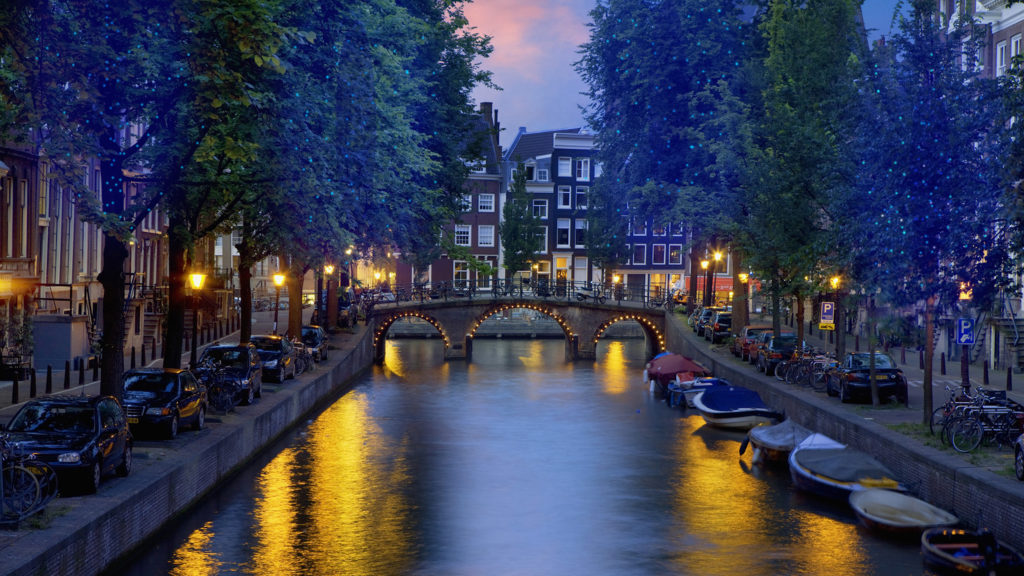 16 Aug 2010, Amsterdam, Netherlands --- Canal at night in Amsterdam --- Image by © Jean-Pierre Lescourret/Corbis